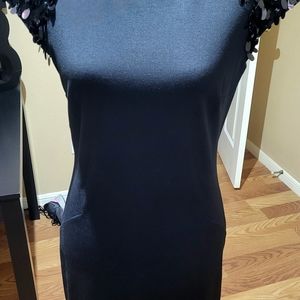 Beautiful black dress. Size 6 back zipper. Gently woren.  No stains, no odors,no